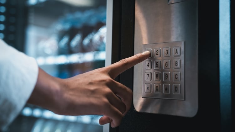 person using vending machine