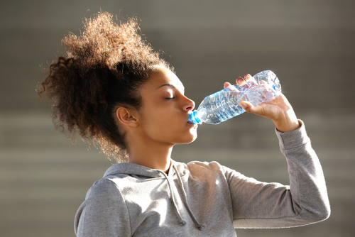 woman drinking healthy